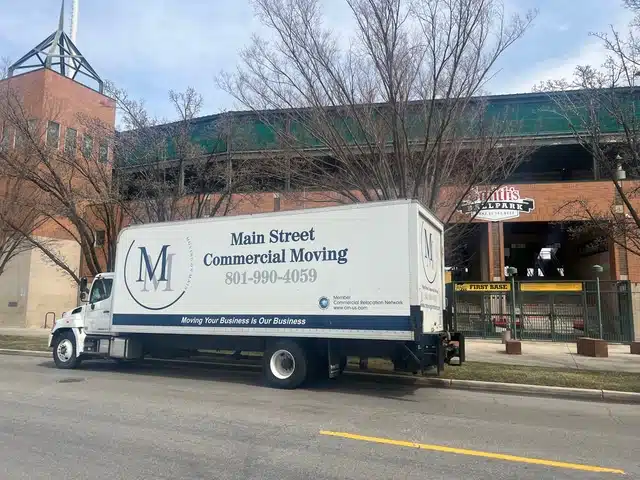 Retail fixtures padded and staged for transport by Moving On Main